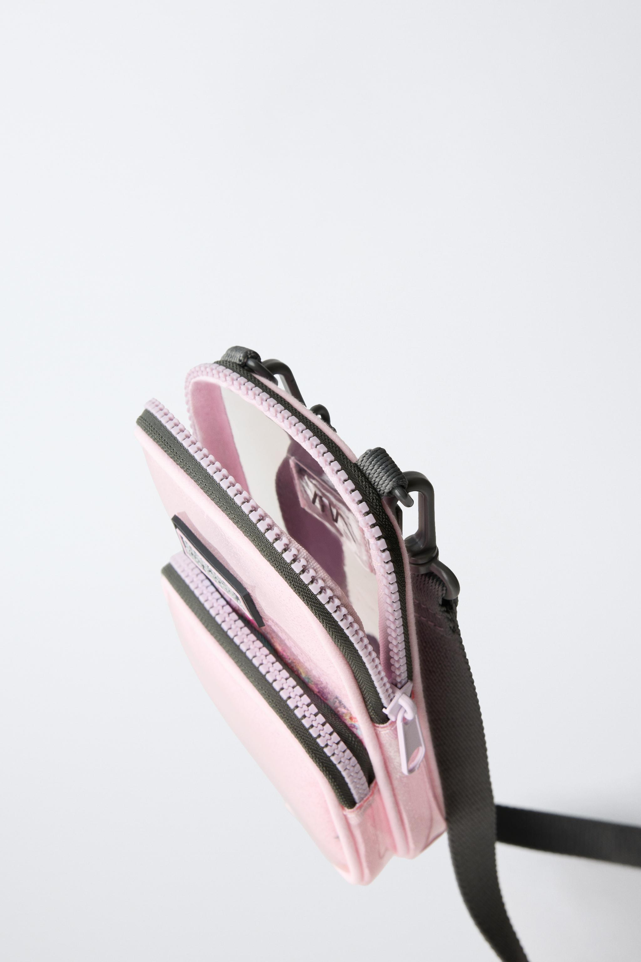 ÉTUI POUR TÉLÉPHONE PORTABLE EN VINYLE